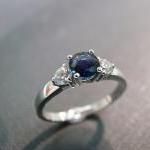 Engagement Ring With Diamond And Blue Sapphire In..
