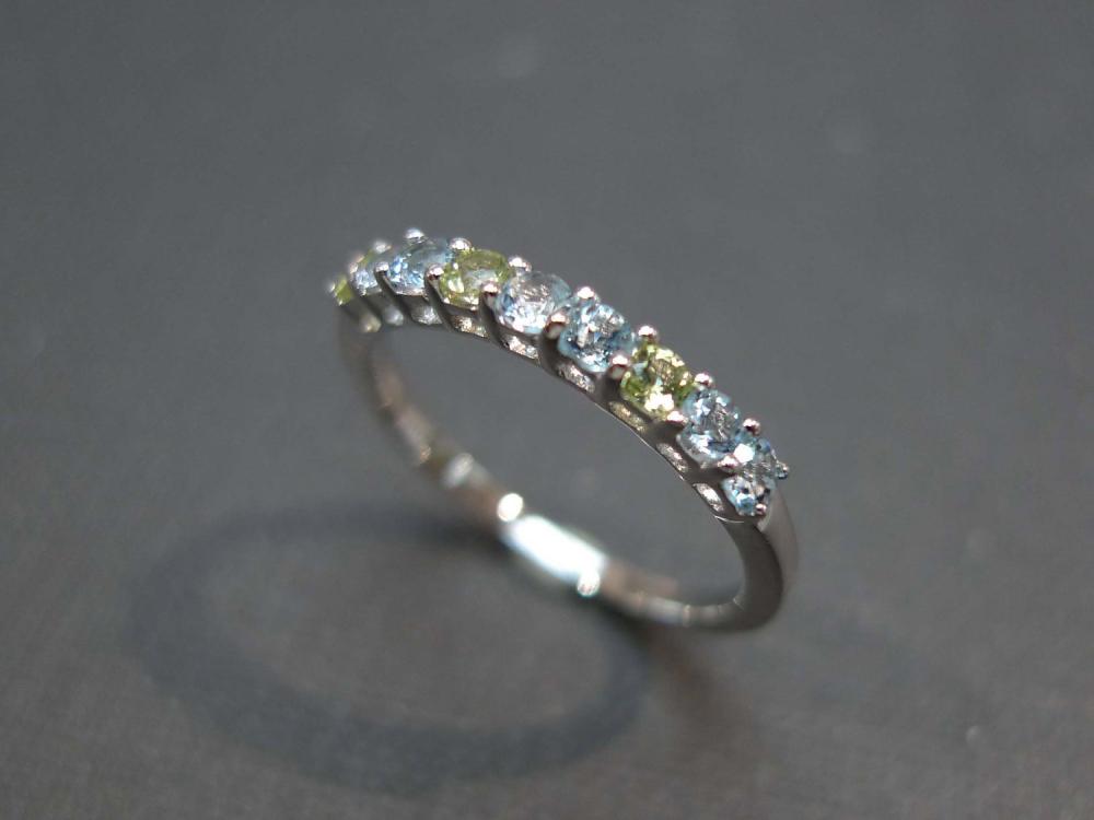 Blue Topaz And Peridot Gemstone Ring In 14 White Gold